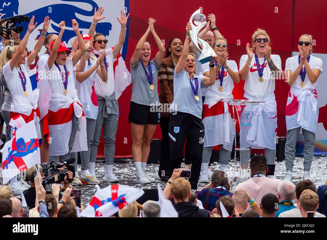 London, UK.  1 August 2022.  Members of the Women’s England football team and manager Sarina Wiegman, holding the trophy, celebrate with 7,000 fans in Trafalgar Square after winning the European Championship final (Euro 2022) against Germany at Wembley Stadium the day before.  Credit: Stephen Chung / Alamy Live News Stock Photo