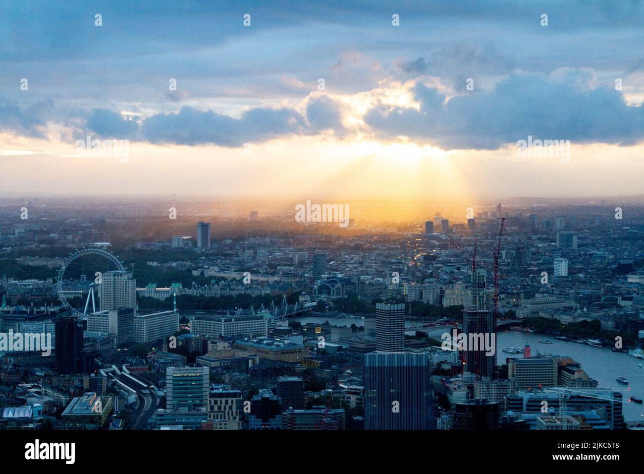 The cityscape of London under a gloomy sunset sky in England Stock