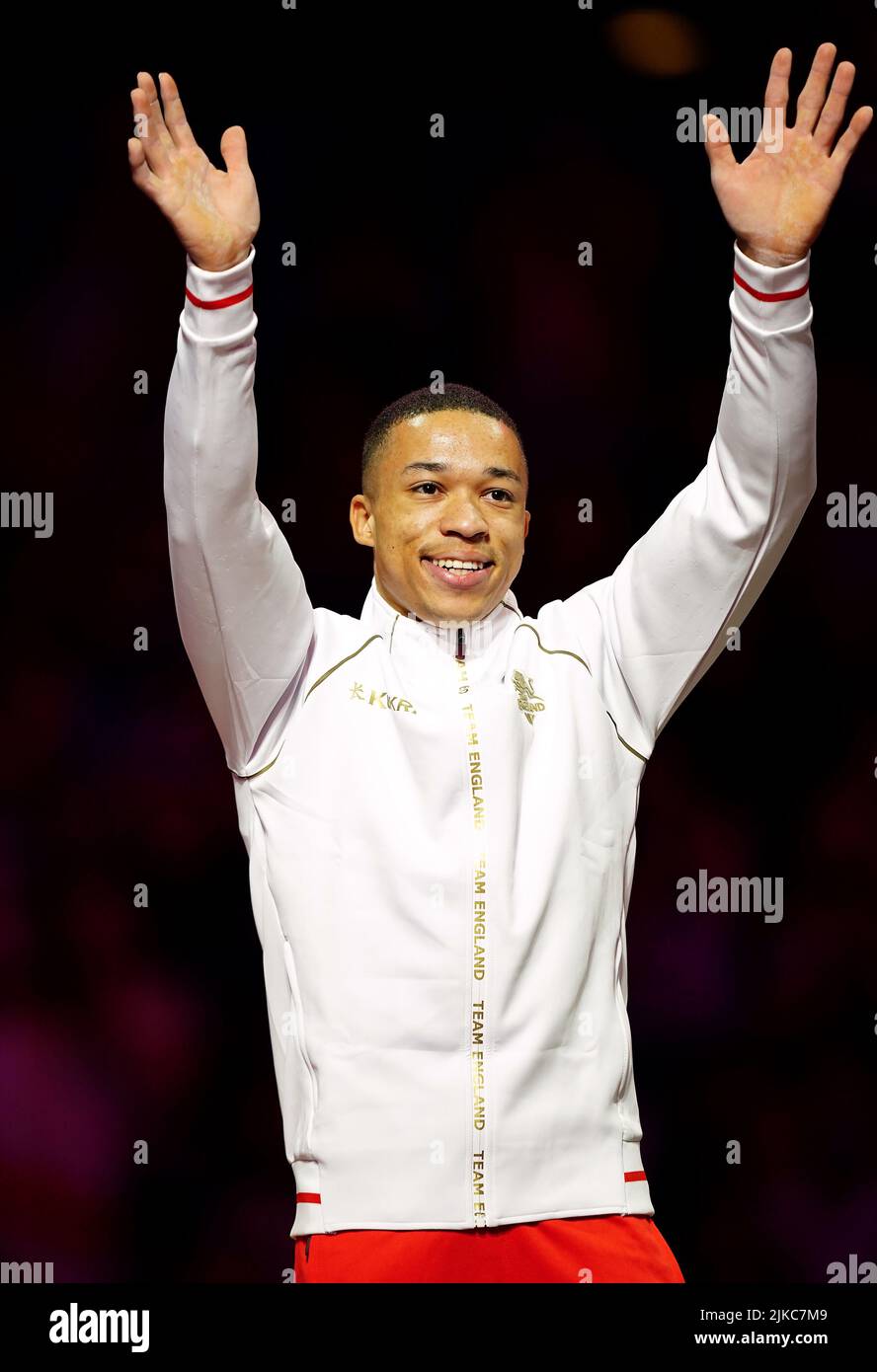 England's Joe Fraser receives his gold medal for the Men's Pommel Horse