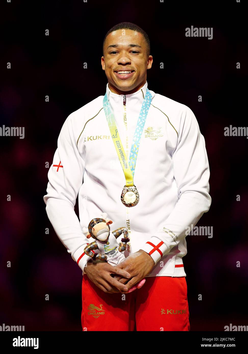 England's Joe Fraser receives his gold medal for the Men's Pommel Horse