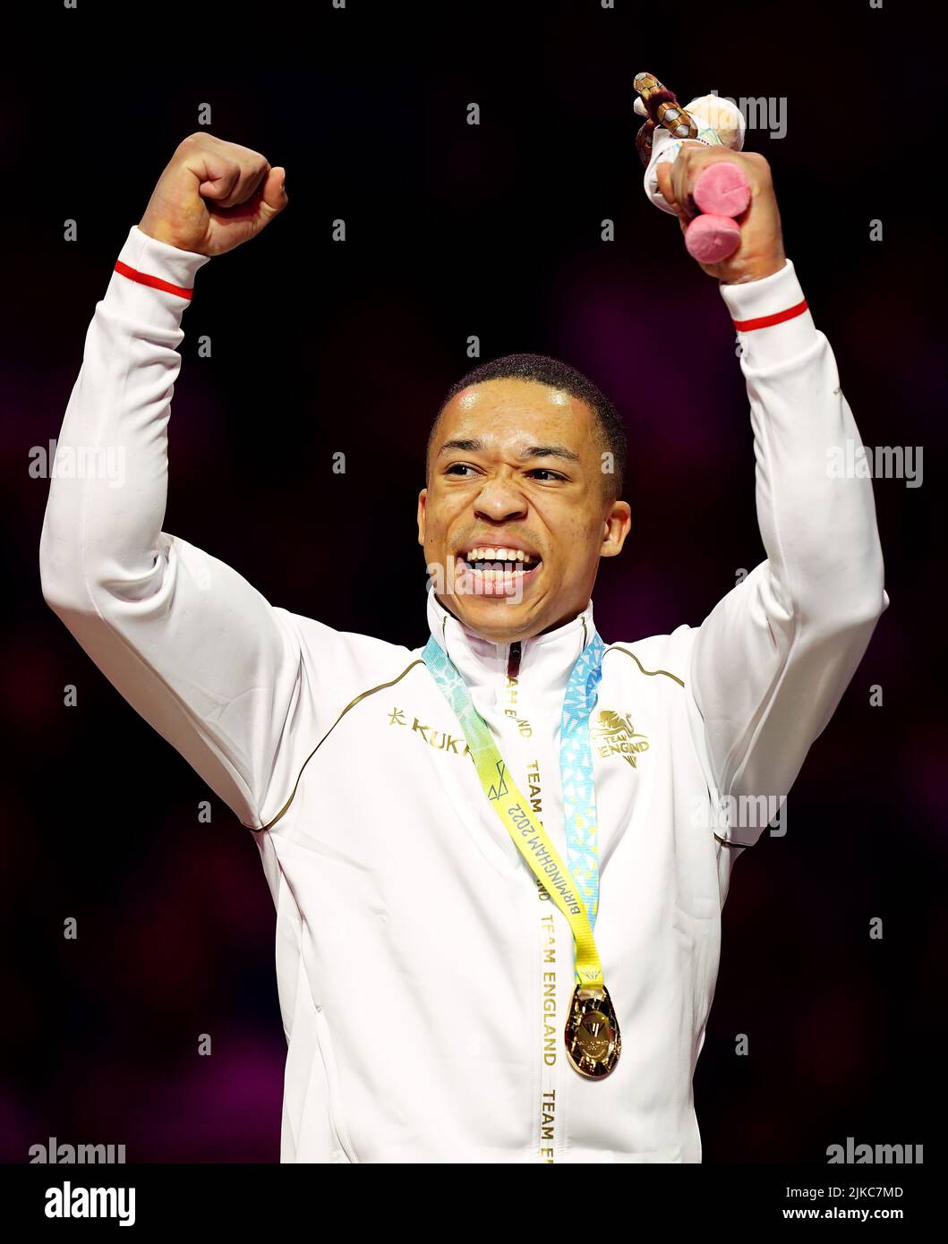 England's Joe Fraser receives his gold medal for the Men's Pommel Horse