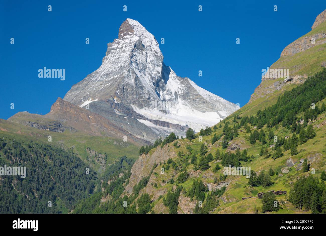 The Matterhorn peak over Mattertal valley in Valliser alps. Stock Photo