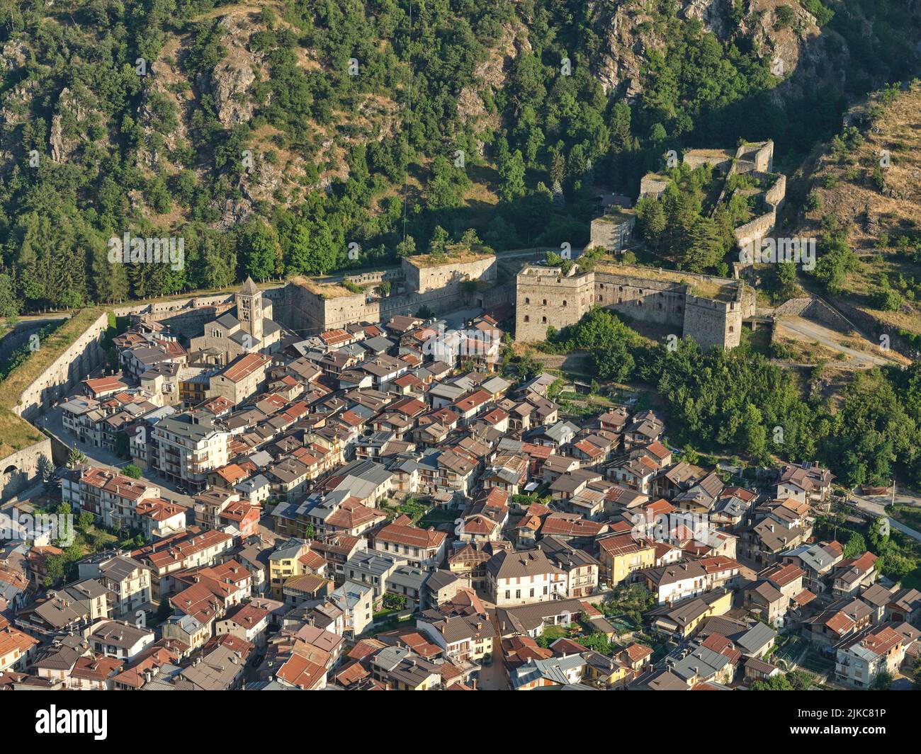 AERIAL VIEW. The Fortress of Vinadio overlooking the medieval town. Stura di demonte Valley, Province of Cuneo, Piedmont, Italy. Stock Photo