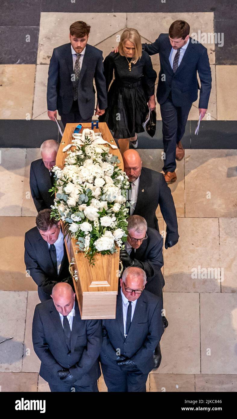 Harry Gration's widow Helen Chene and sons Harvey (left) and Harrison (right) walk behind his the coffin of Harry Gration as they leave a service of thanksgiving for the BBC presenter at York Minster in York. Picture date: Monday August 1, 2022. Stock Photo