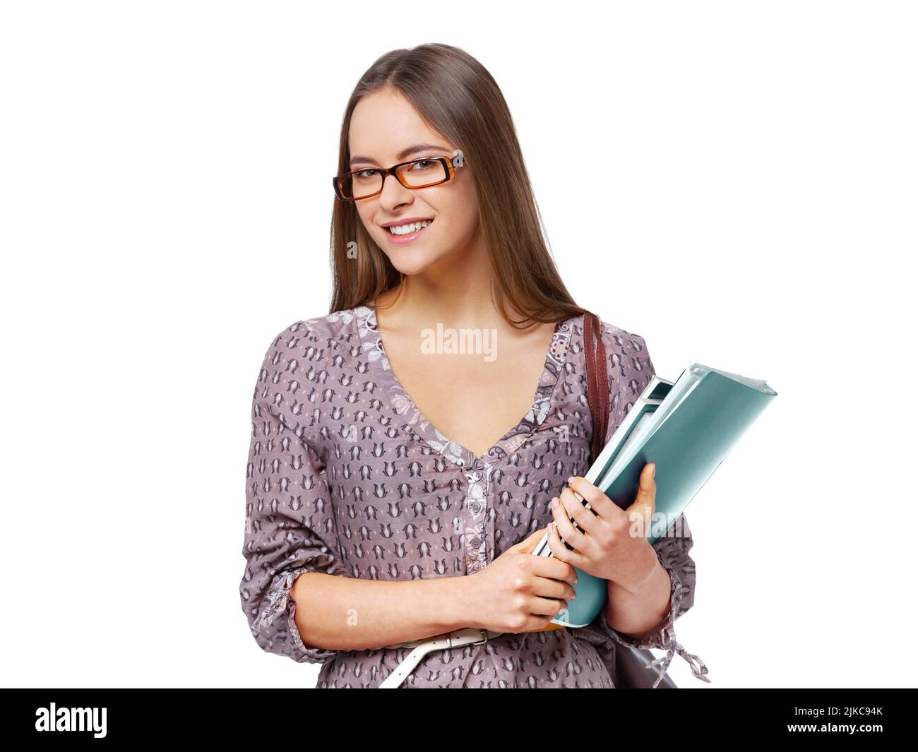 Beautiful female student with books isolated on white background. Stock Photo