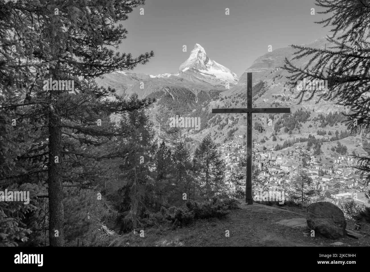 The Matterhorn peak with the cross over the Zermatt. Stock Photo
