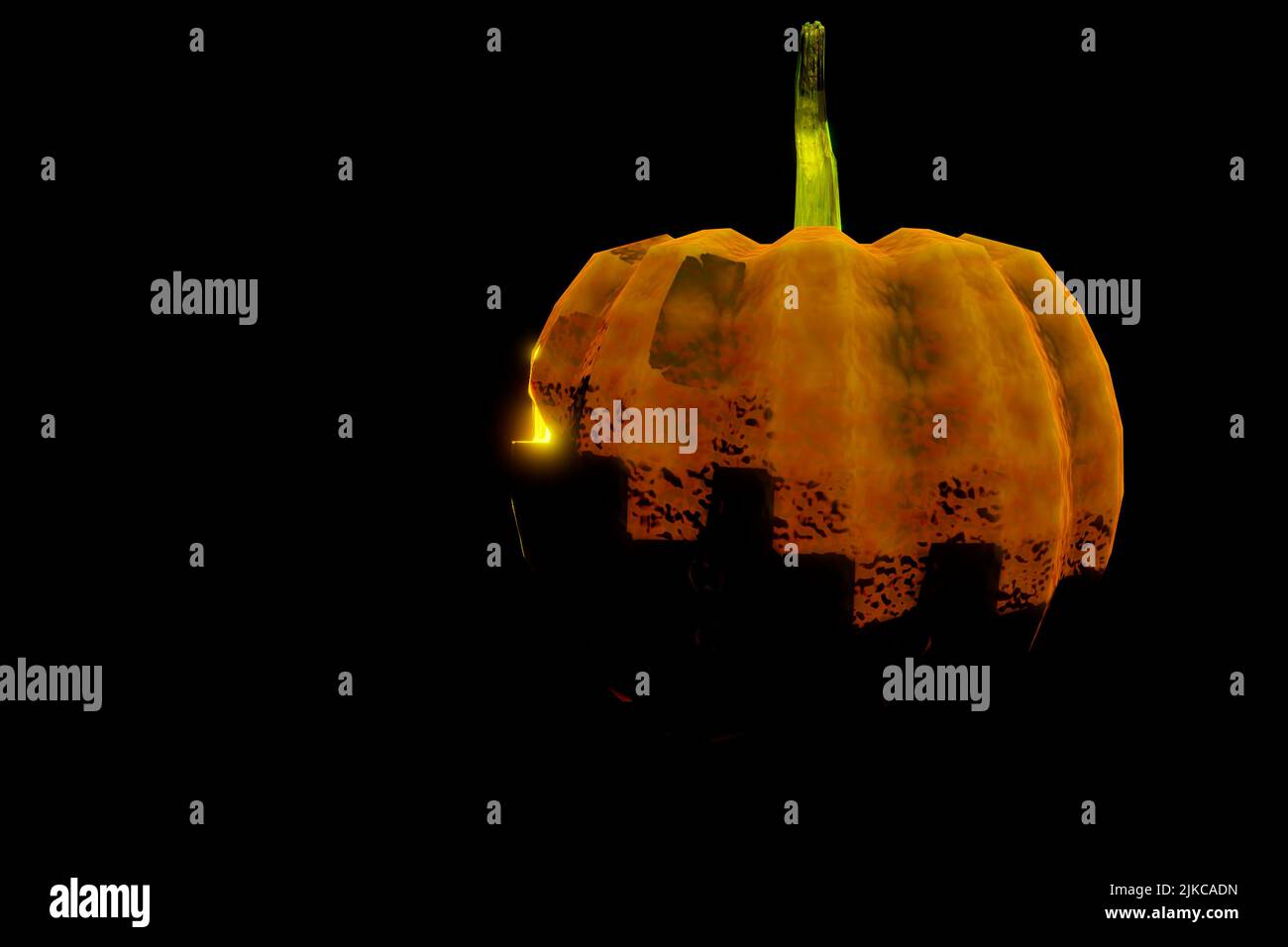 Pumpkin emerging from the darkness while in profile a bright yellow light stands out glowing in the dark on halloween night Stock Photo