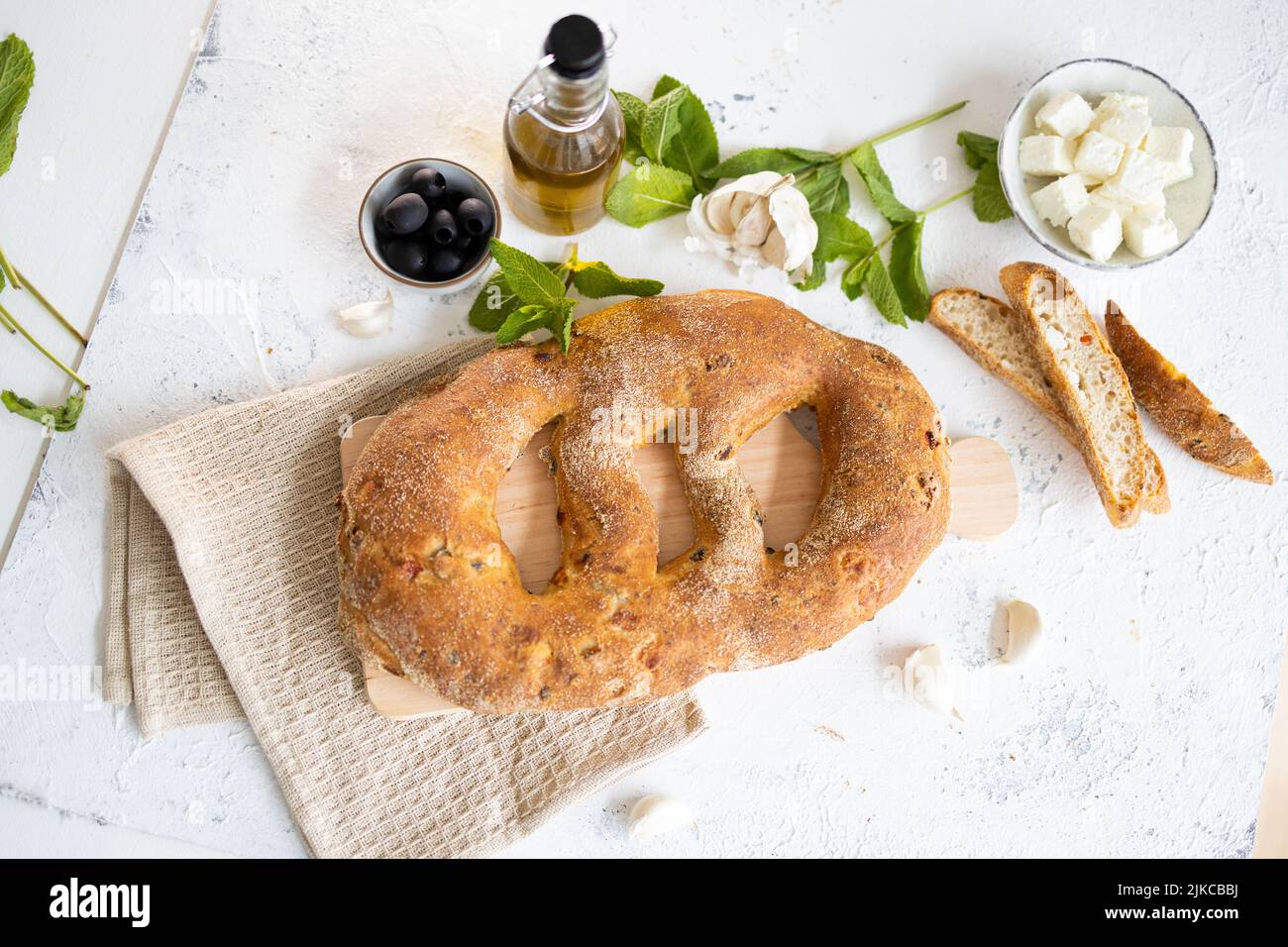 Mediterranean Bread with olives, oil for BBQ isolated Topshot Stock Photo