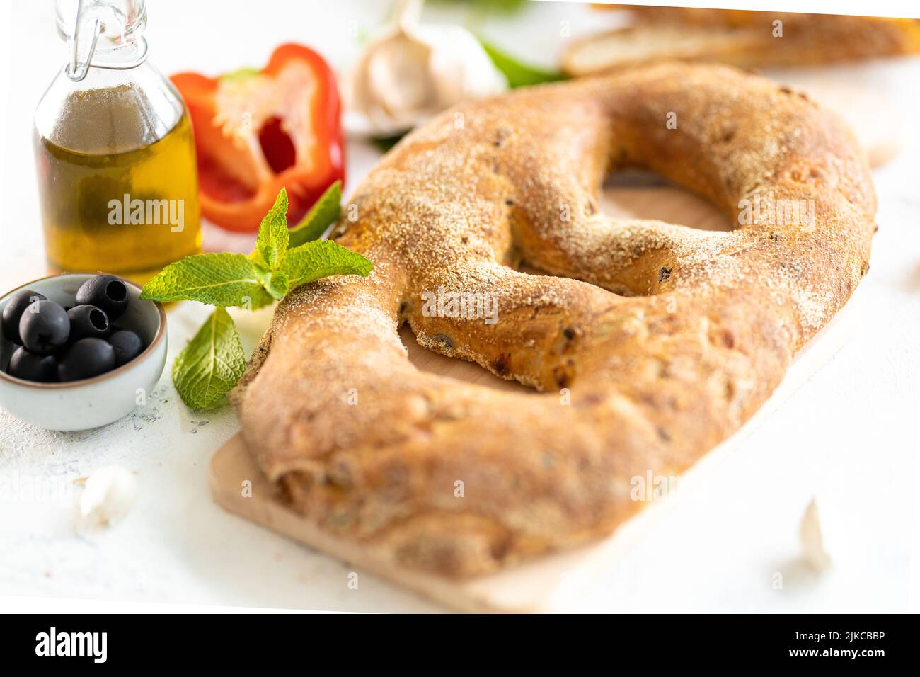 Mediterranean Bread with olives, oil for BBQ isolated Topshot Stock Photo