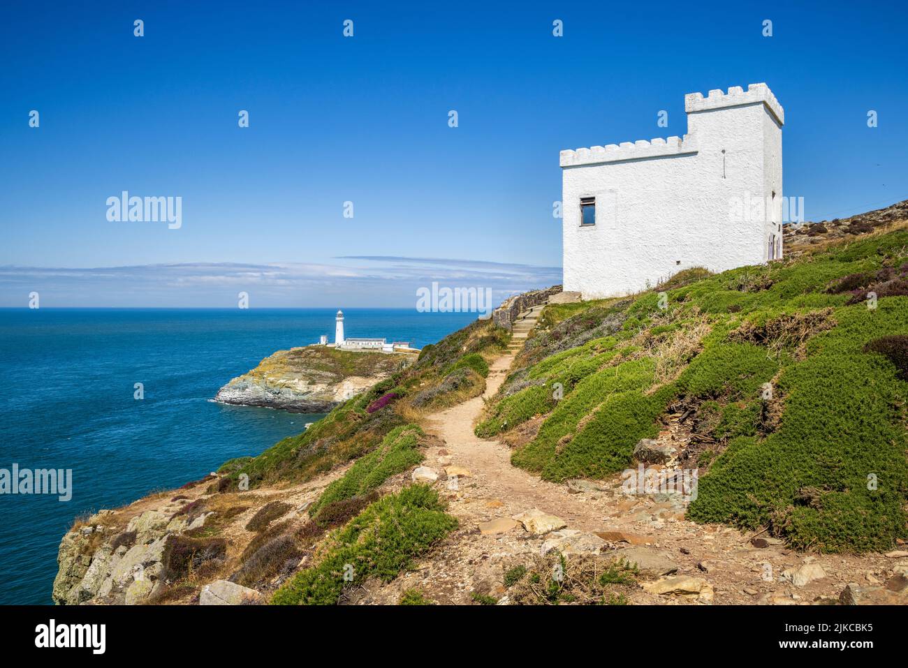 South Stack Lighthouse and Elin’s Tower on the Wales Coast Path, Holy Island, Anglesey, North Wales Stock Photo