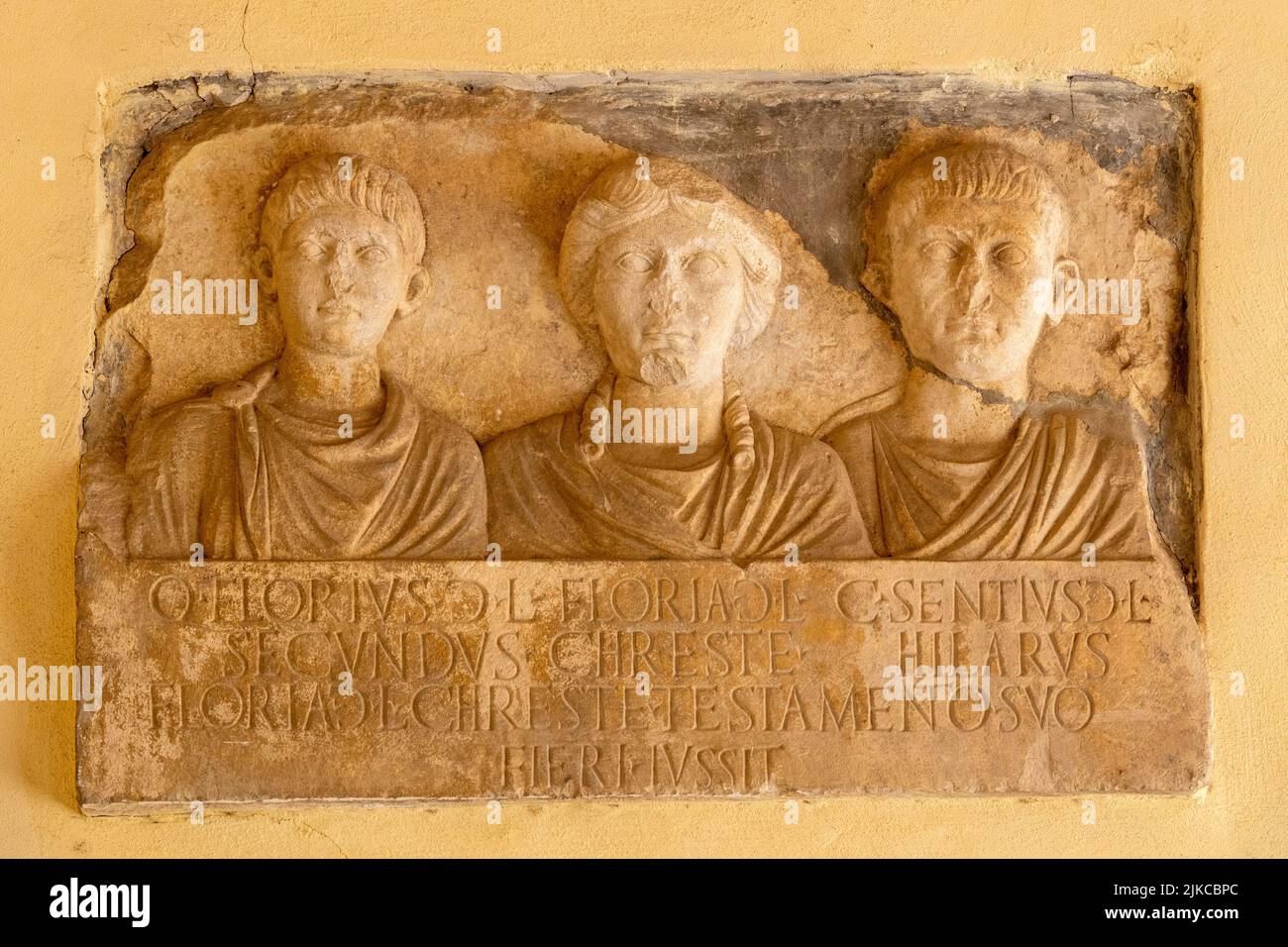 Roman funeral monument dedicated to three freedmen in the city hall of Penne, Italy Stock Photo