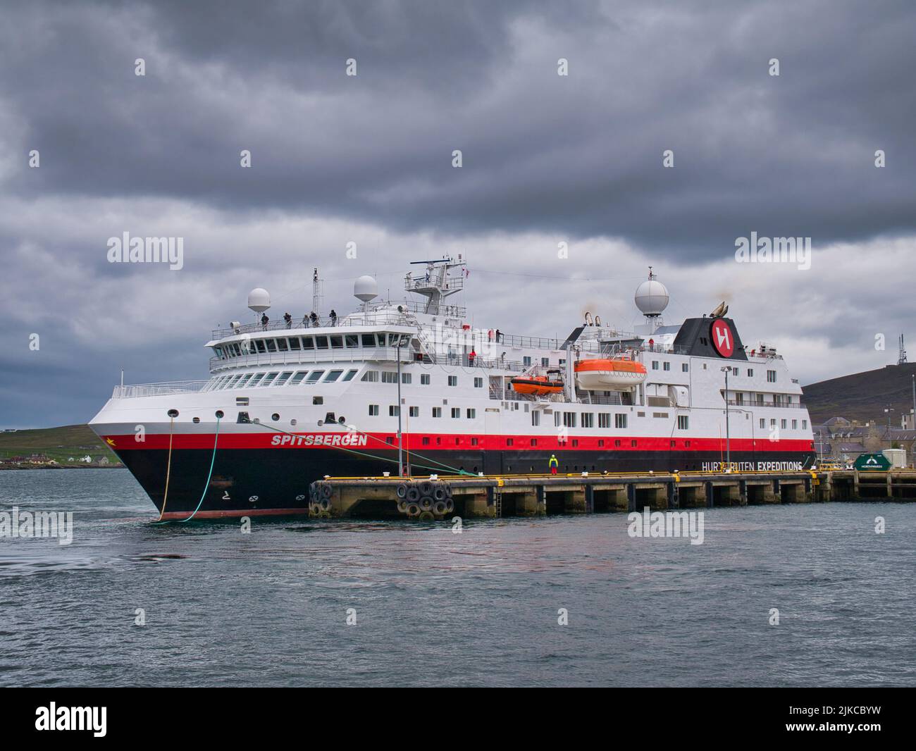 The Hurtigruten cruise ship Spitsbergen moored at Lerwick, capital of Shetland in the UK. Taken on a cloudy, overcast day. Stock Photo