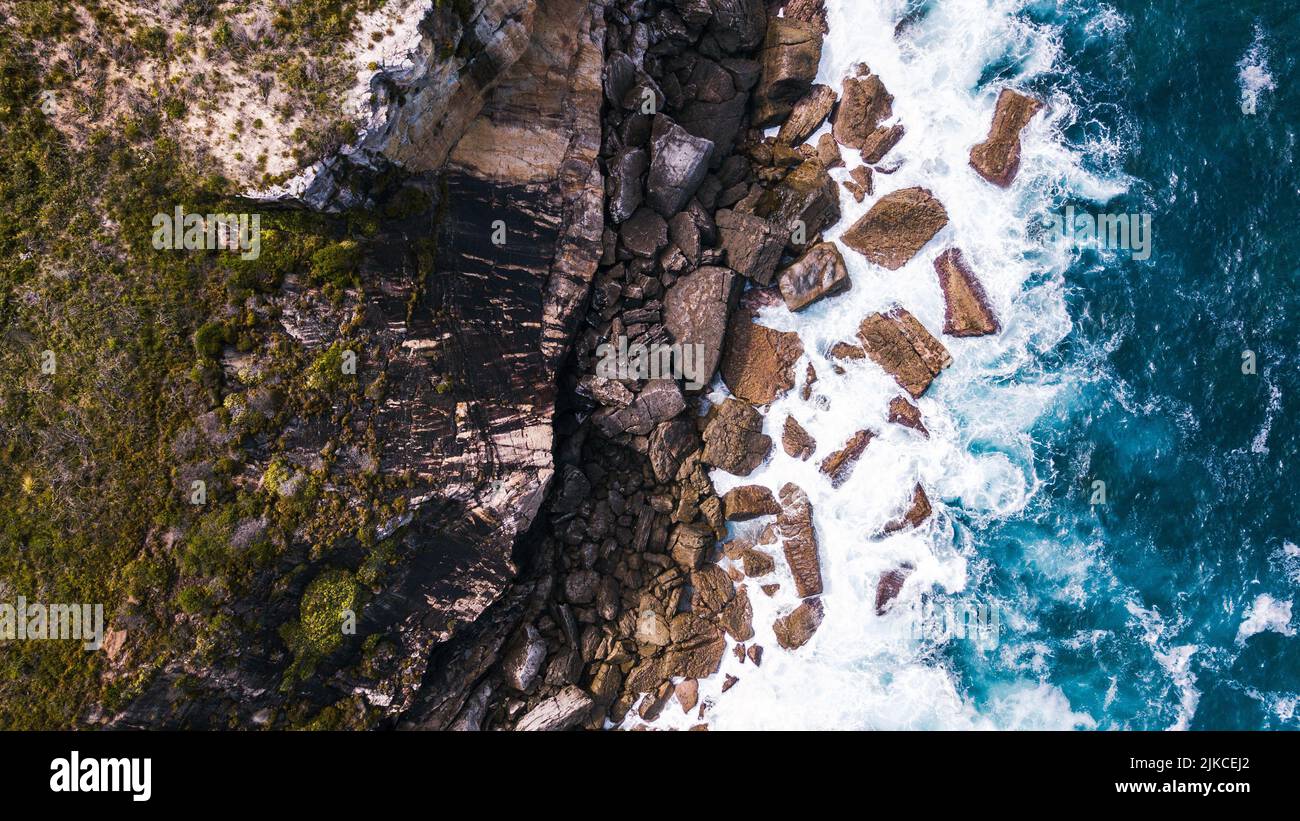 Aerial foamy sea waves rocky hi-res stock photography and images - Alamy