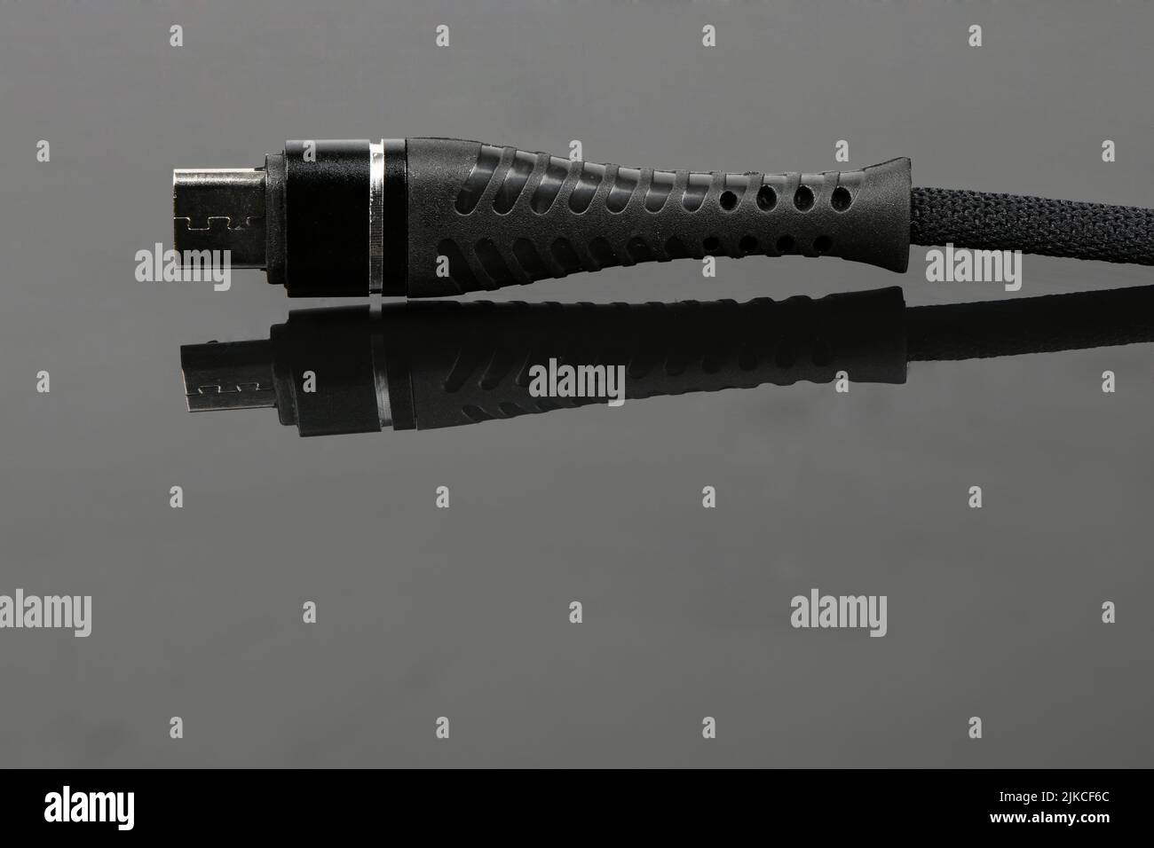 Closeup of an USB connector on black acrylic background. High ...