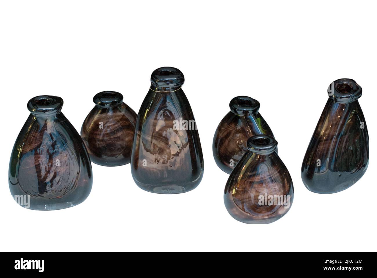 A collection of glass vases with different shapes and sizes isolated on