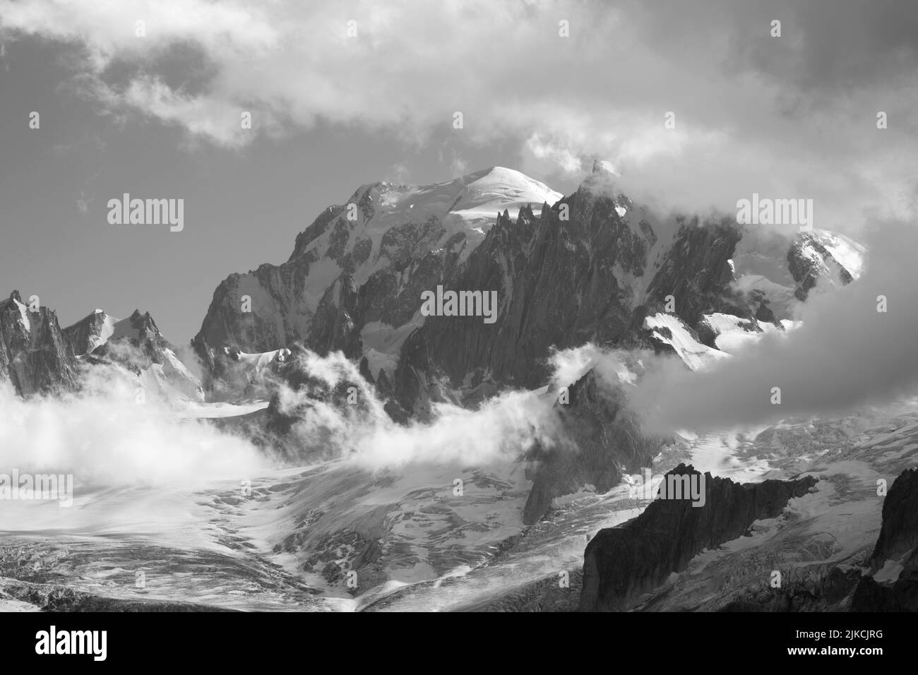 The Mont Blanc massif in the evening light and clouds. Stock Photo