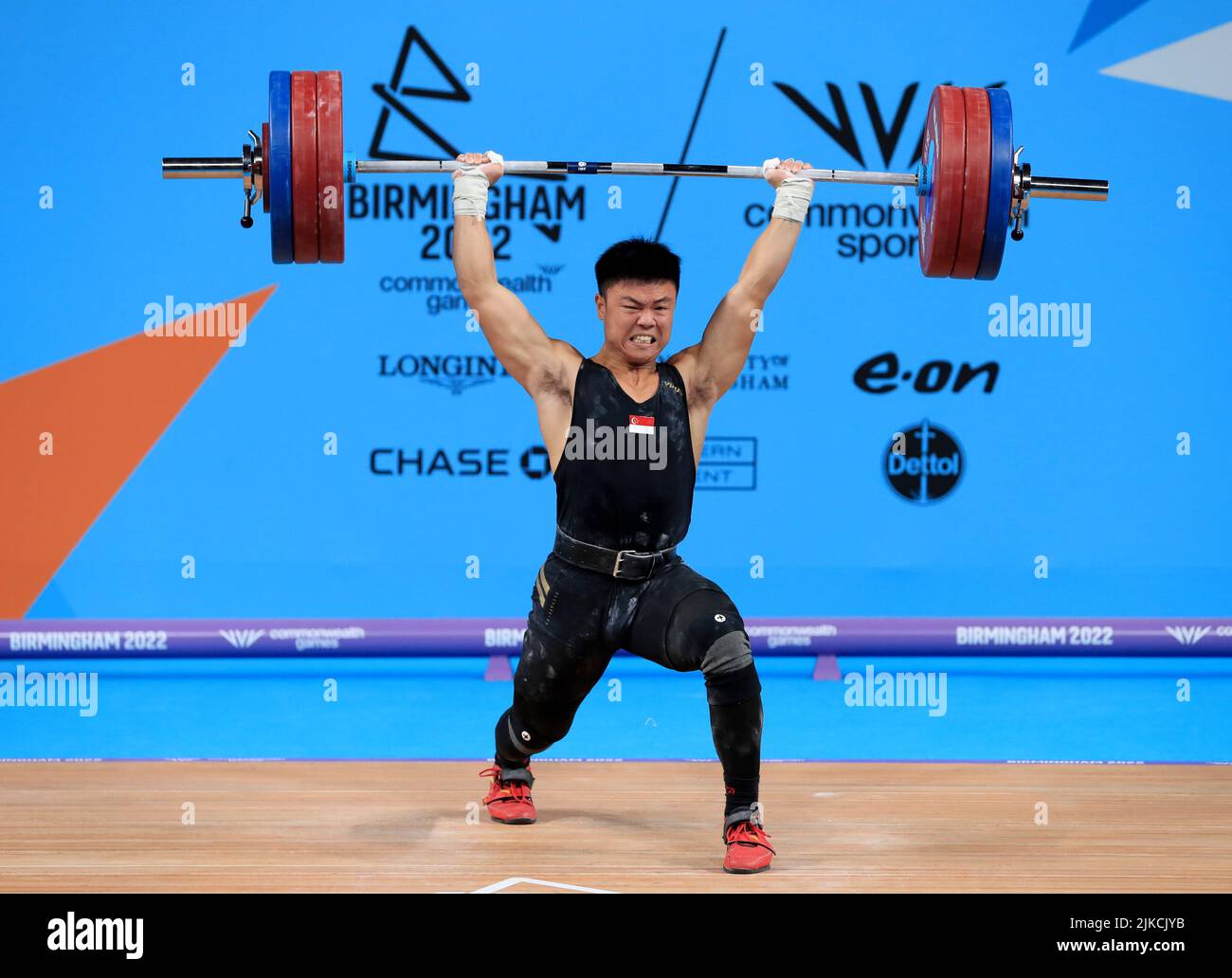 Singapore’s Kang Yin Lim makes a lift during the Men’s 81kg ...