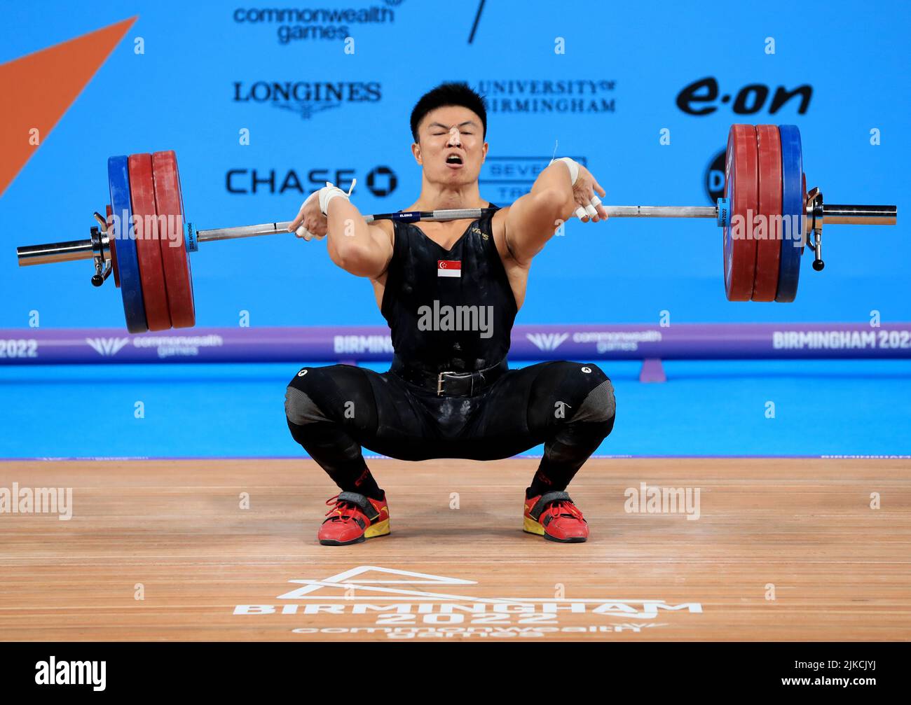Singapore’s Kang Yin Lim makes a lift during the Men’s 81kg ...