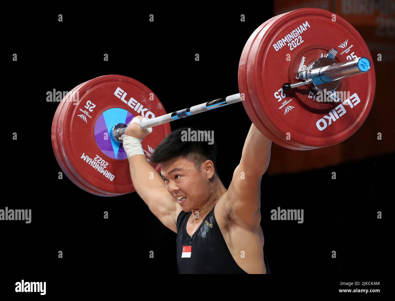 Singapore’s Kang Yin Lim makes a lift during the Men’s 81kg ...