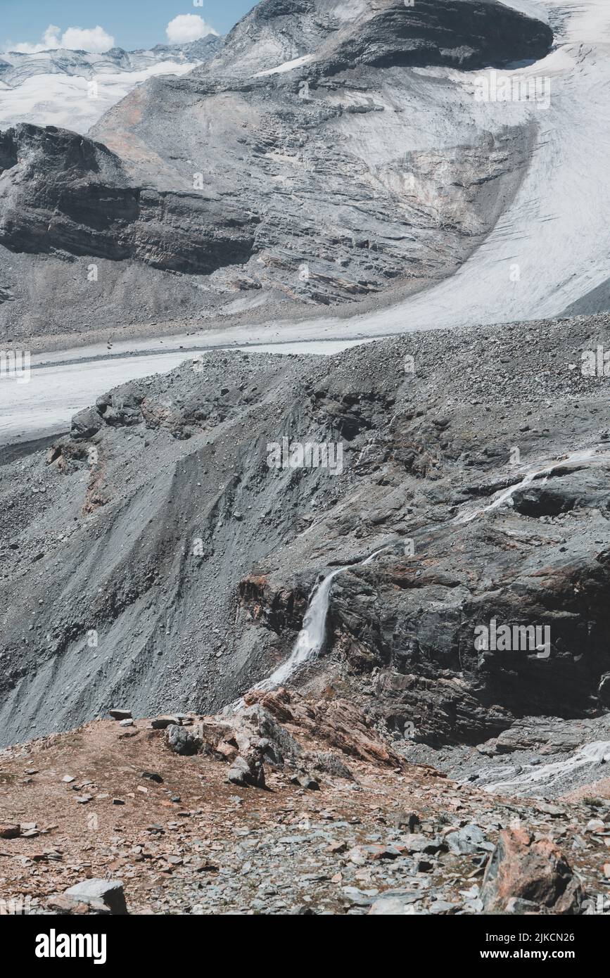Vertical shot of melting glaciers demonstrating climate change Stock Photo