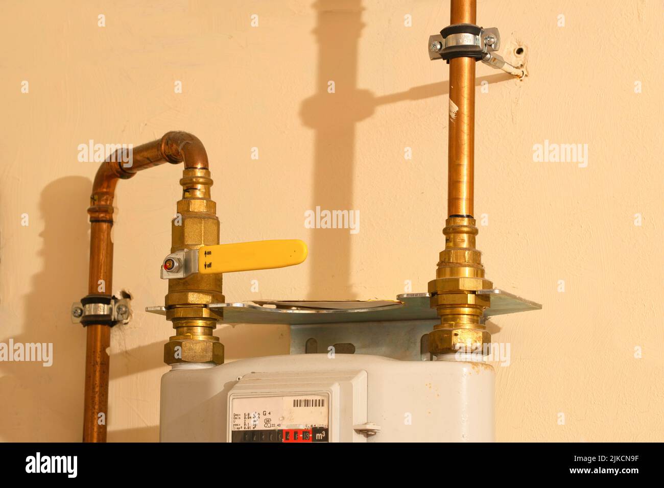 view of a domestic gas line, lever closed, no gas Stock Photo Alamy