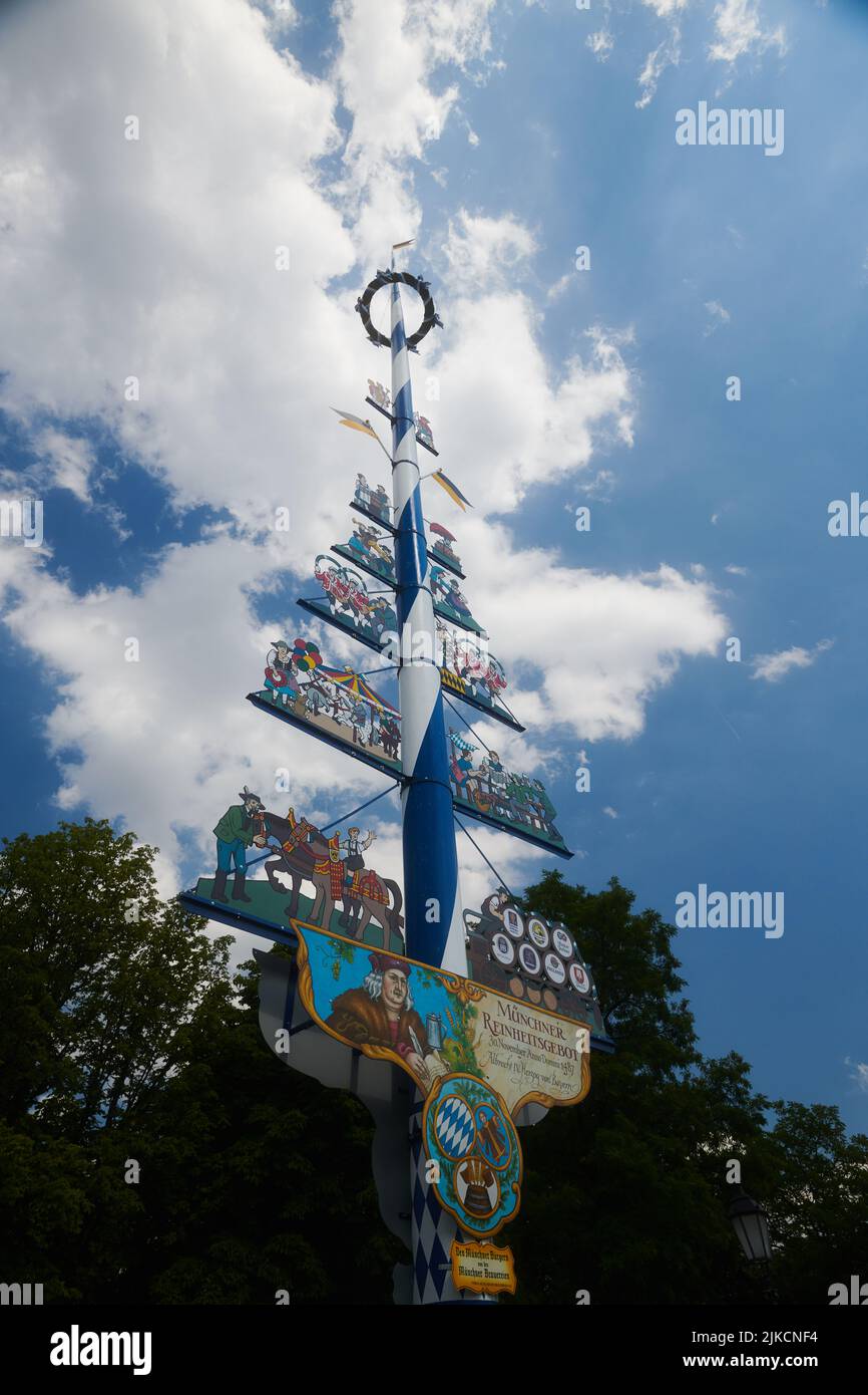 Traditional Bavarian Maibaum standing tall Stock Photo