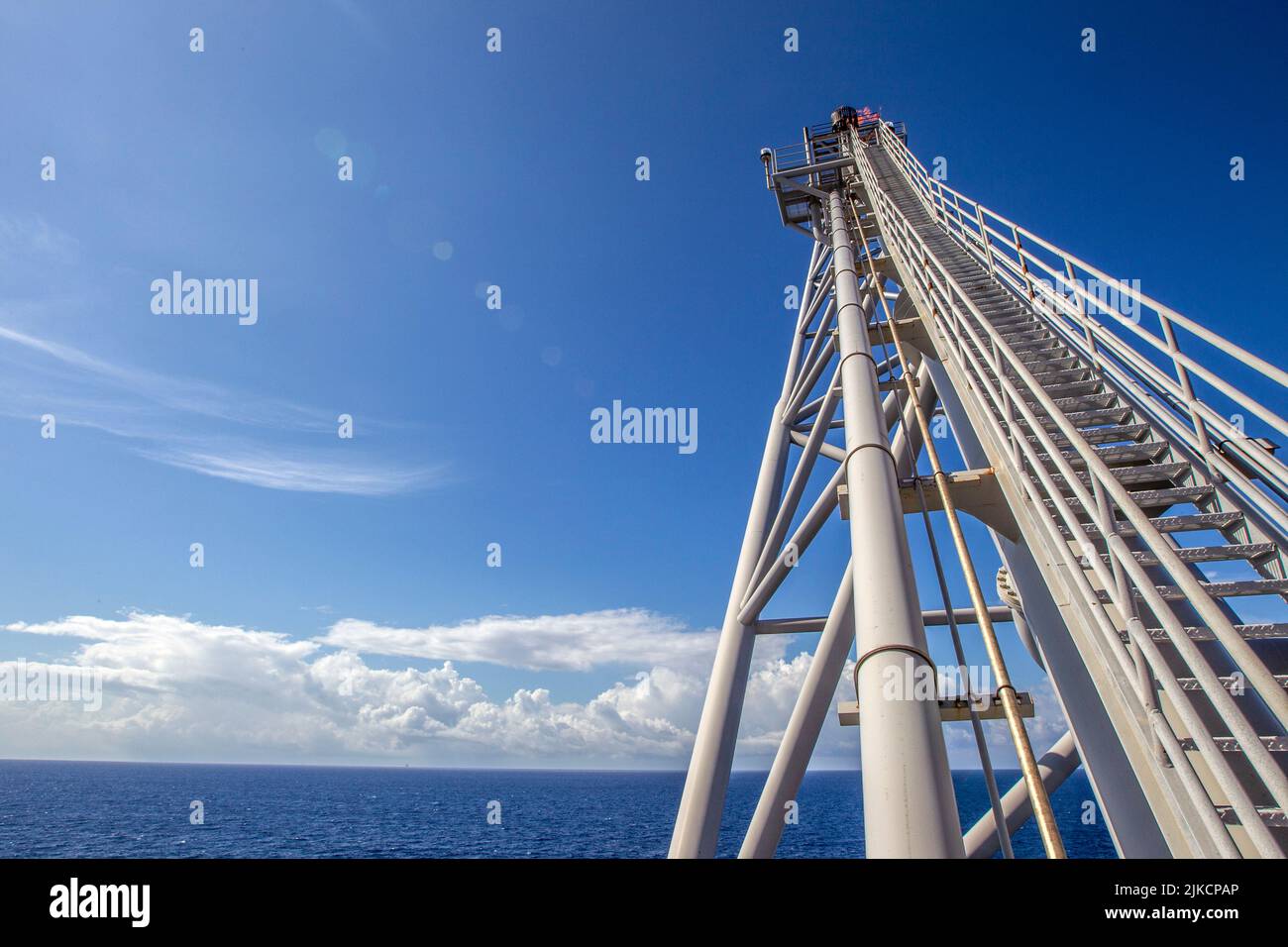 Flare stack on offshore platform Stock Photo