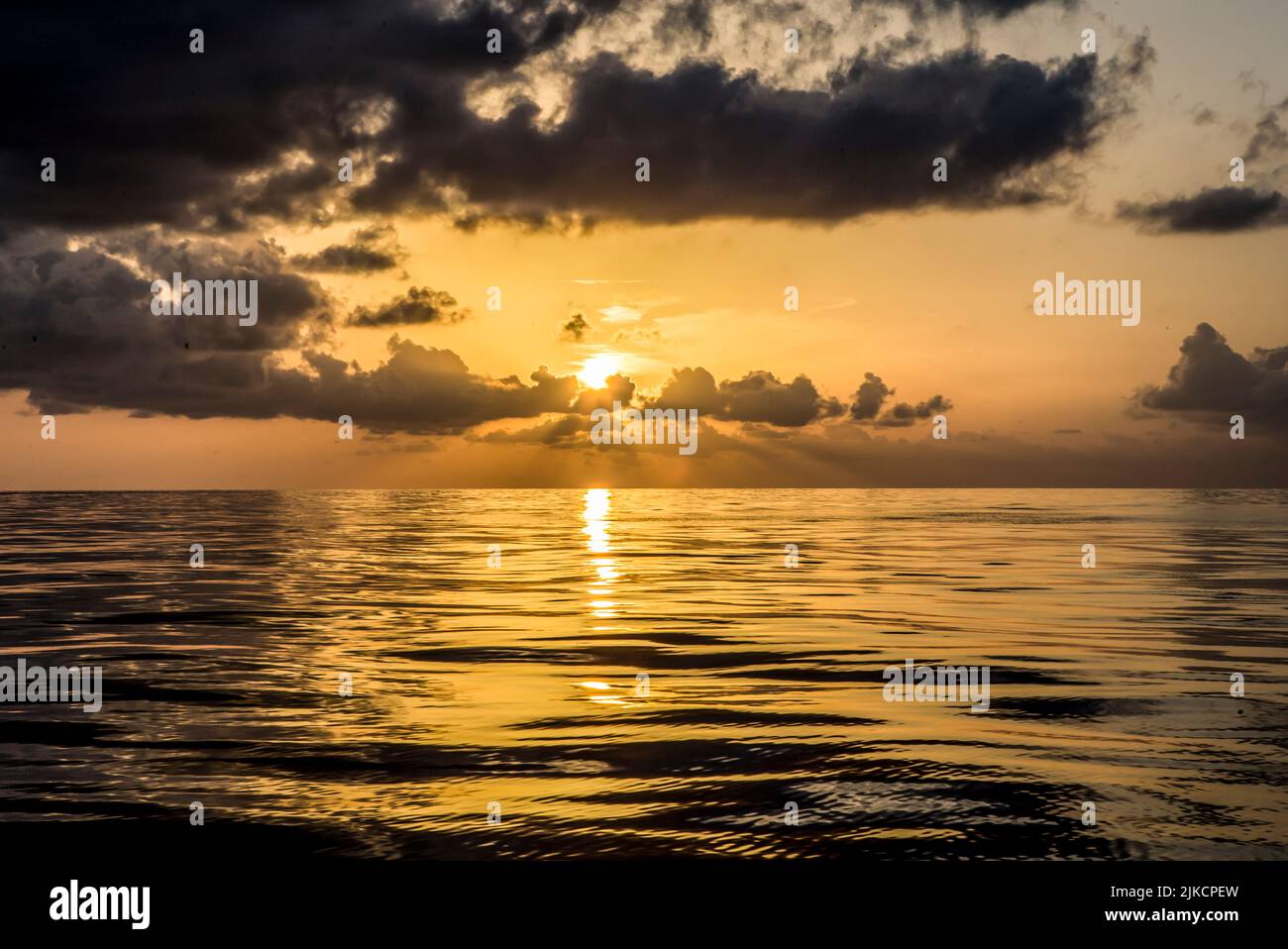 View of Gulf of Mexico from an offshore platform at sunset Stock Photo
