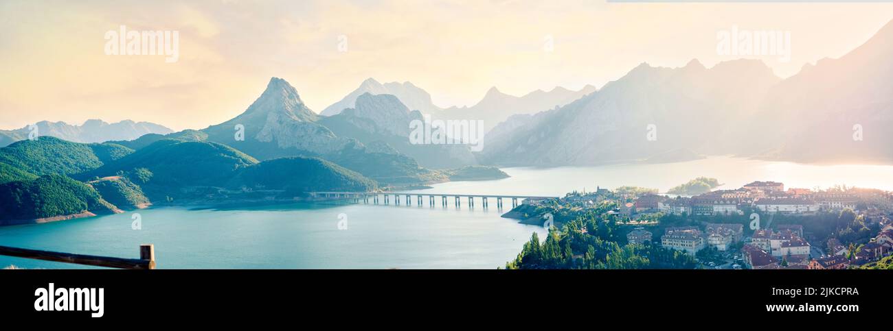Panorama of RiaÃ±o, reservoir and mountains with Gilbo peak at sunset Stock Photo