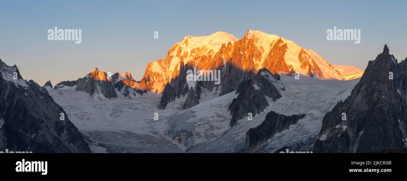 The panorama of Mont Blanc massif in the morning light. Stock Photo