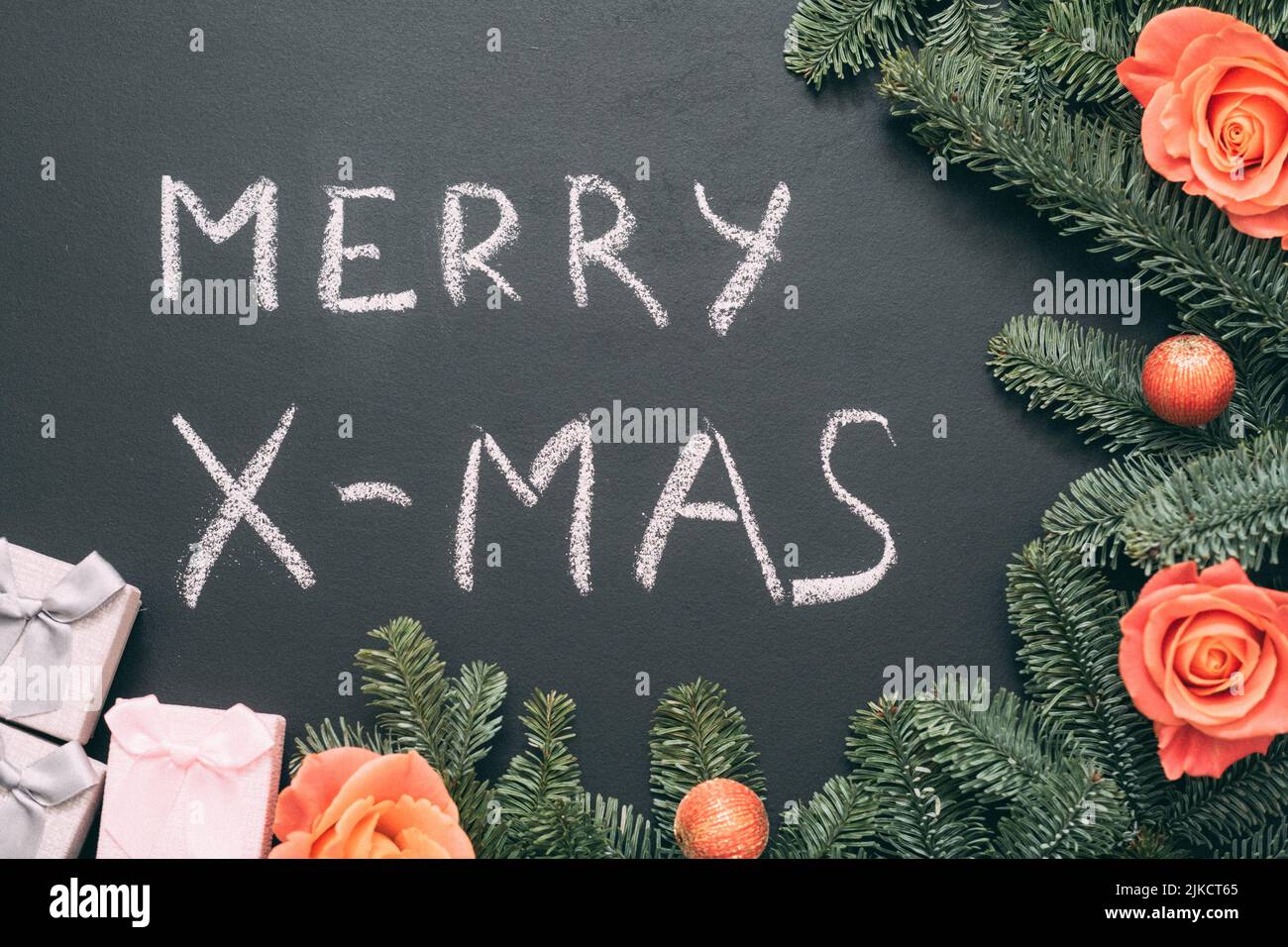 merry christmas fir tree rose buds gift boxes Stock Photo Alamy