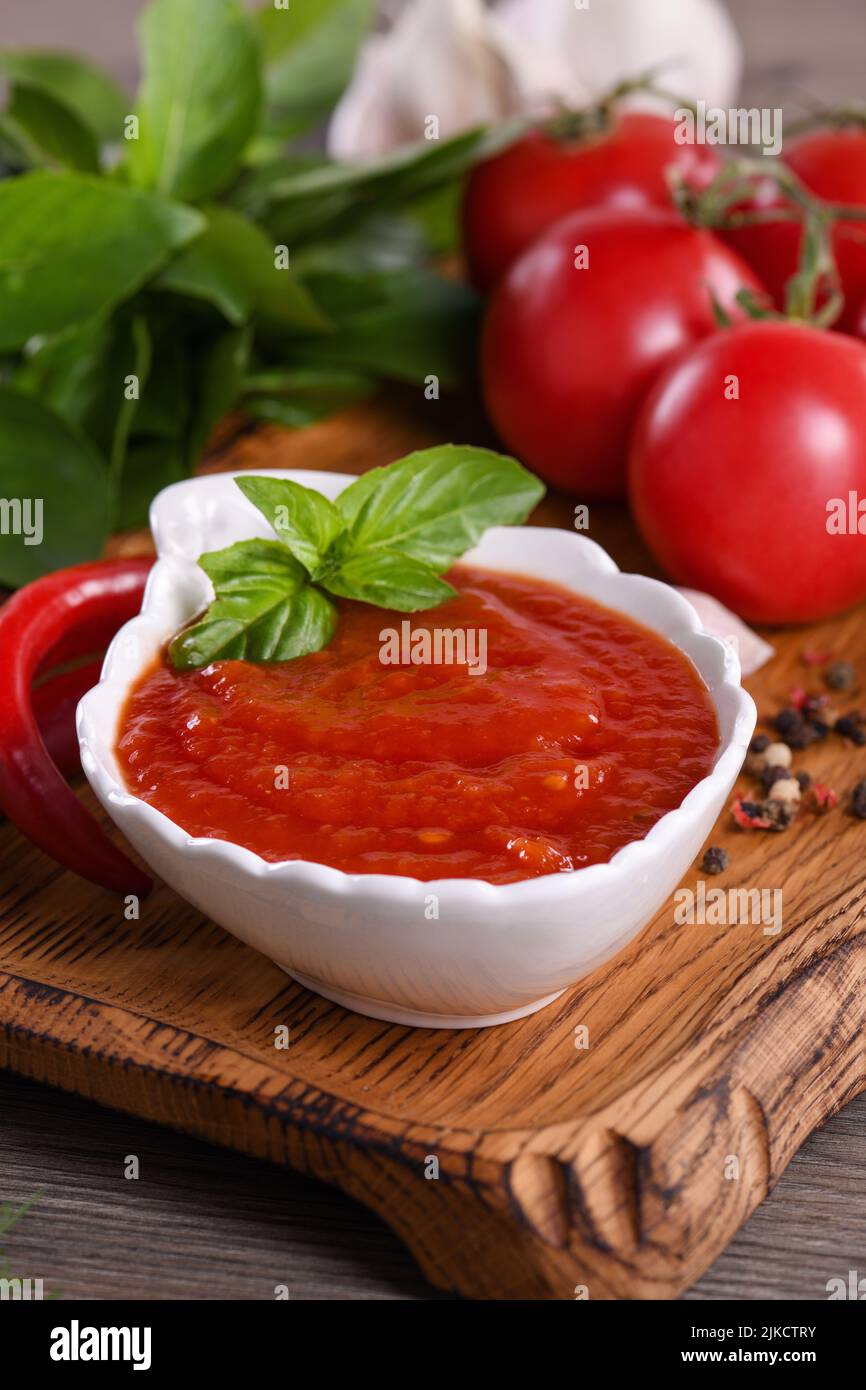 Traditional classic homemade tomato sauce with spices and herbs