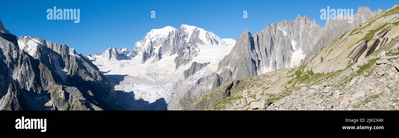 The panorama of Mont Blanc massif and  Les Aiguilles towers. Stock Photo