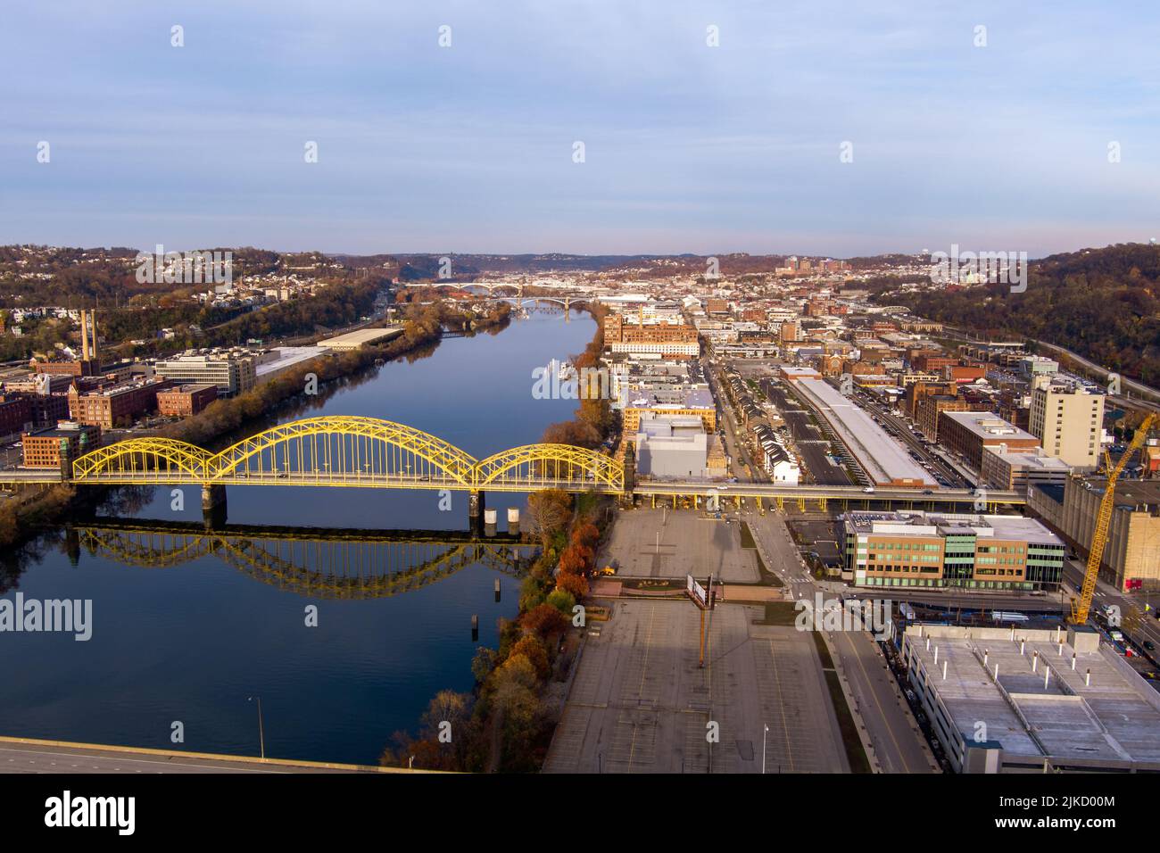 Aerial view of Pittsburgh, Pennsylvania's Strip District (right). The David McCullough 16th Street Bridge crosses the Allegheny River from Troy Hill ( Stock Photo