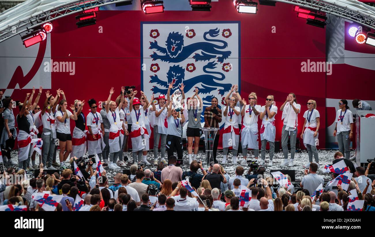 Sarina Wiegman holds up the trophy to the fans following England’s Euro 2022 success in the final against Germany. Stock Photo