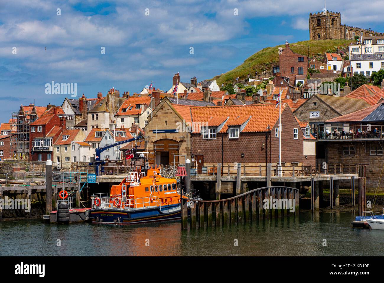 The Whitby lifeboat moored at the RNLI station in the Harbour of the Yorkshire town Stock Photo