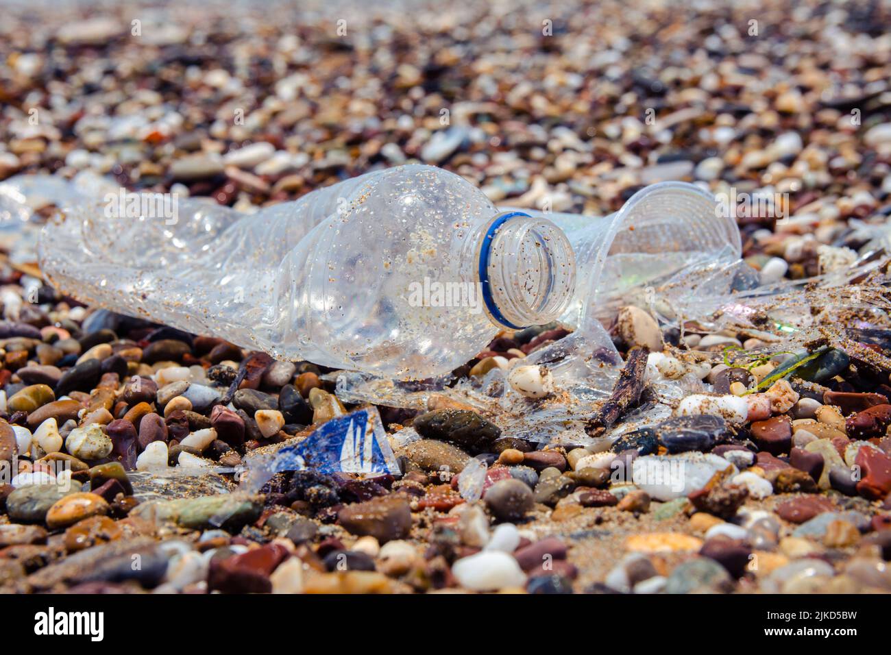 Garbage on the sea beach. A manmade garbage in the sea plastic