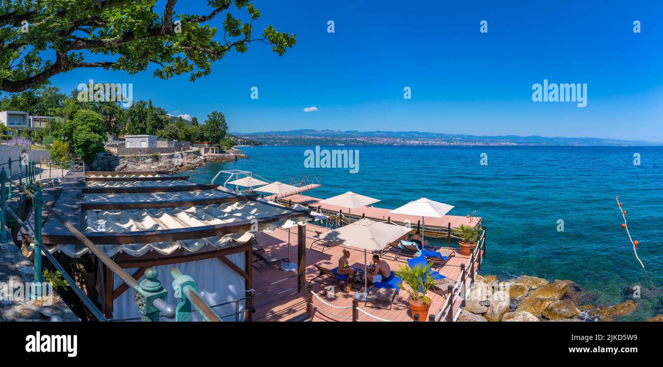 View of seaside bar overlooking Adriatic Sea, Lovran, Kvarner Bay, Eastern Istria, Croatia, Europe Stock Photo