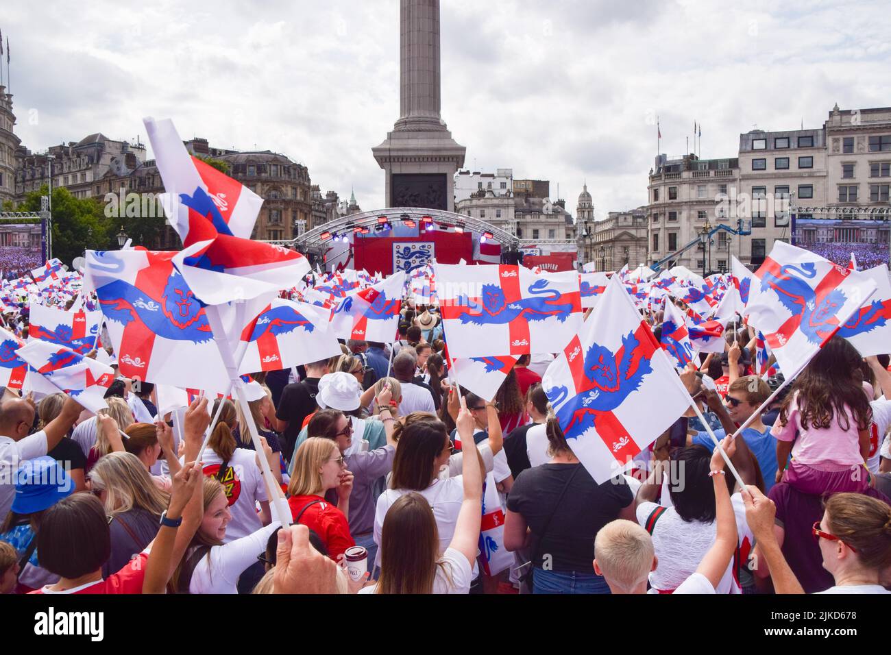 London, UK. 01st Aug, 2022. Supporters wave England flags during the Women's Euro 2022 special event in Trafalgar Square. Thousands of people gathered to celebrate the England team, known as the Lionesses, winning Women's Euro 2022 soccer tournament. England beat Germany 2-1. Credit: SOPA Images Limited/Alamy Live News Stock Photo