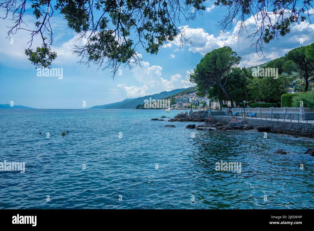 View of coastal walk path with town of Opatija in background, Opatija, Kvarner Bay, Croatia, Europe Stock Photo