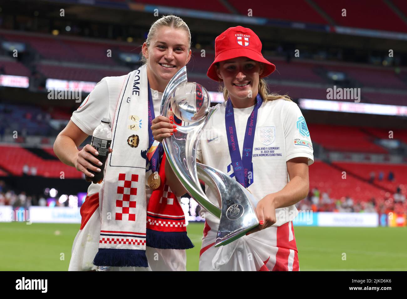 London, England, 31st July 2022. Alessia Russo and Ella Toone of England pose with the trophy following the 2-1 extra time victory in the UEFA Women's European Championship 2022 match at Wembley Stadium, London. Picture credit should read: Jonathan Moscrop / Sportimage Stock Photo