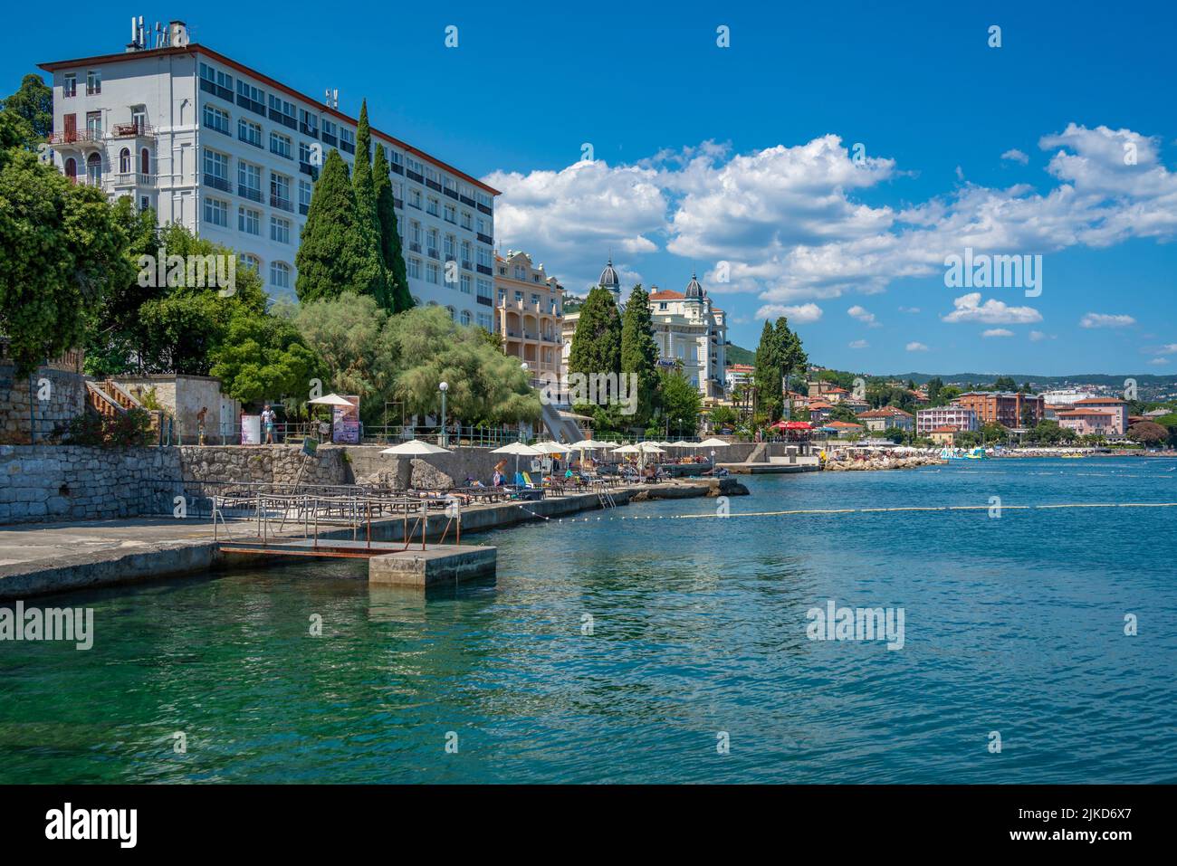 View of hotels and sunshades on The Lungomare promenade in the town of Opatija, Opatija, Kvarner Bay, Croatia, Europe Stock Photo
