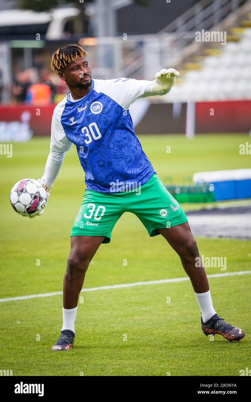 Odense, Denmark. 29th, July 2022. Reserve goalkeeper Sayouba Mande of OB is warming up before the 3F Superliga match between Odense Boldklub and FC Midtjylland at Nature Energy Park in Odense. (Photo credit: Gonzales Photo - Kent Rasmussen). Stock Photo