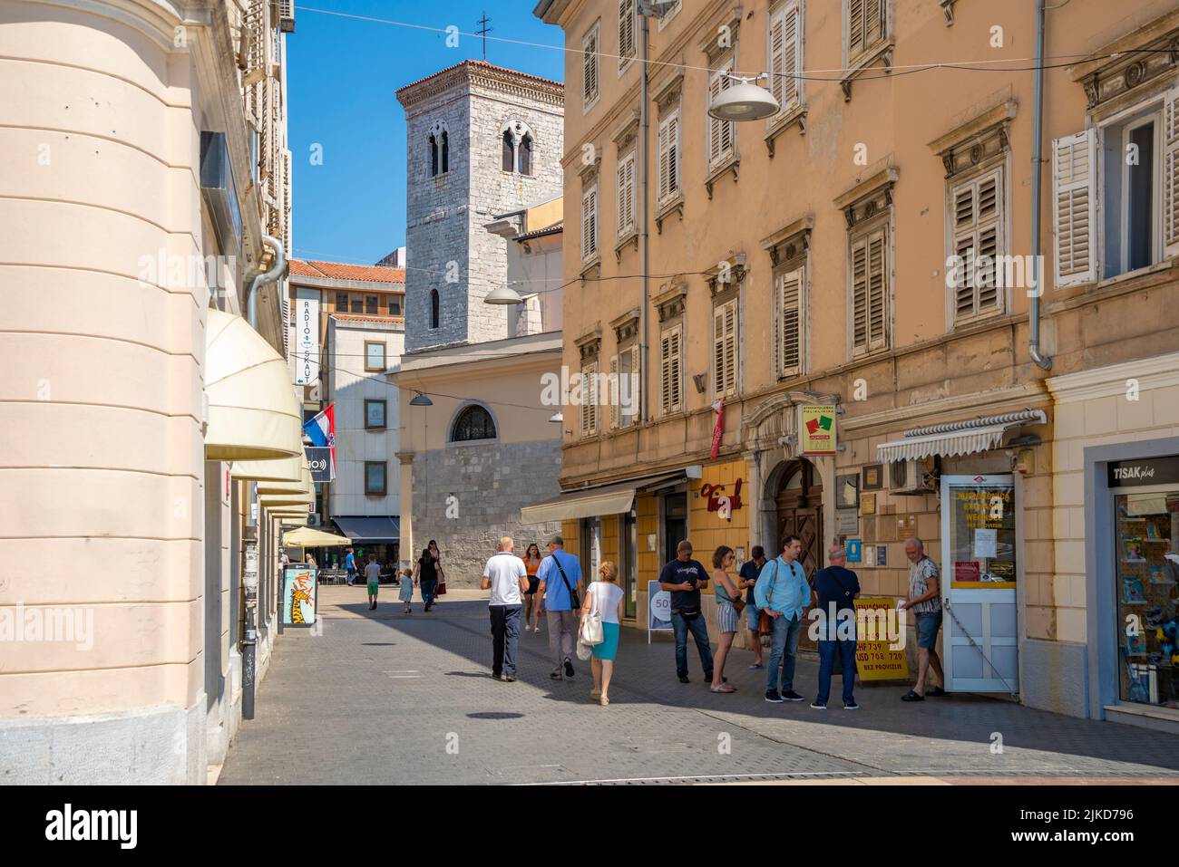 View of shops, people and Leaning Tower on Pul Vele Crikve, Rijeka, Croatia, Europe Stock Photo