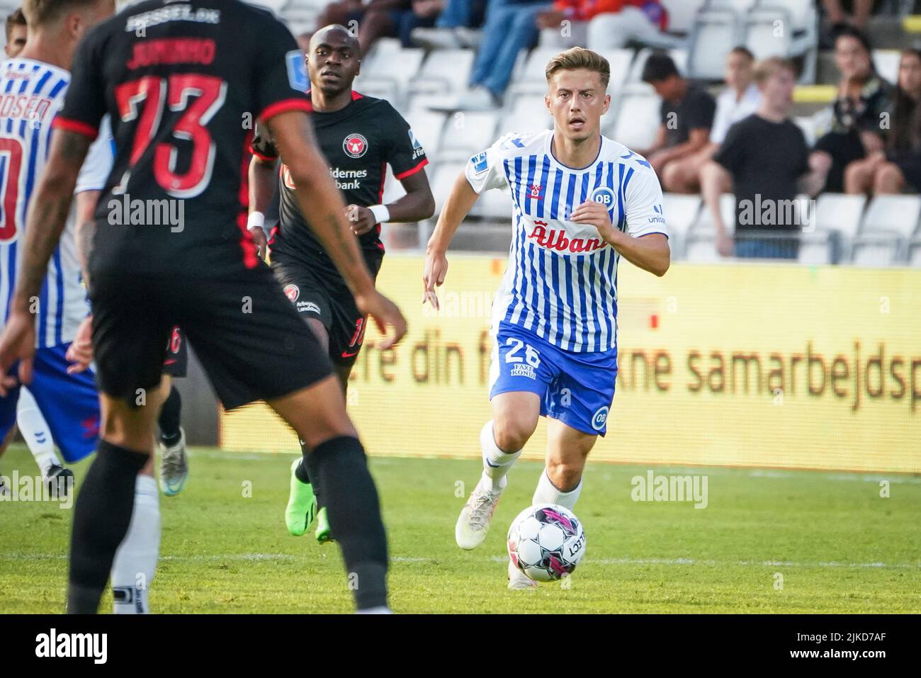 Odense, Denmark. 29th, July 2022. Agon Mucolli (26) of OB seen during the  3F Superliga match between Odense Boldklub and FC Midtjylland at Nature  Energy Park in Odense. (Photo credit: Gonzales Photo -
