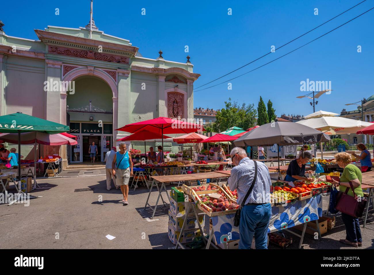 View of fruit and vegetable stall and exterior of ornate Central Market building, Rijeka, Croatia, Europe Stock Photo