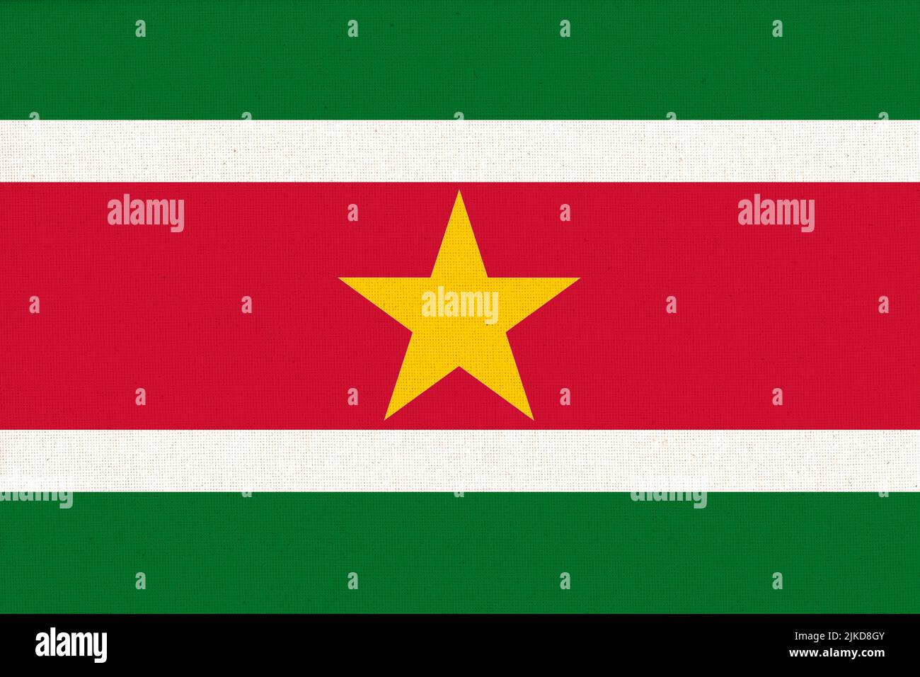 Flag of Suriname. Surinamese flag on fabric surface. Fabric Texture. National symbol. Republic of Suriname. Surinamese national flag. Stock Photo