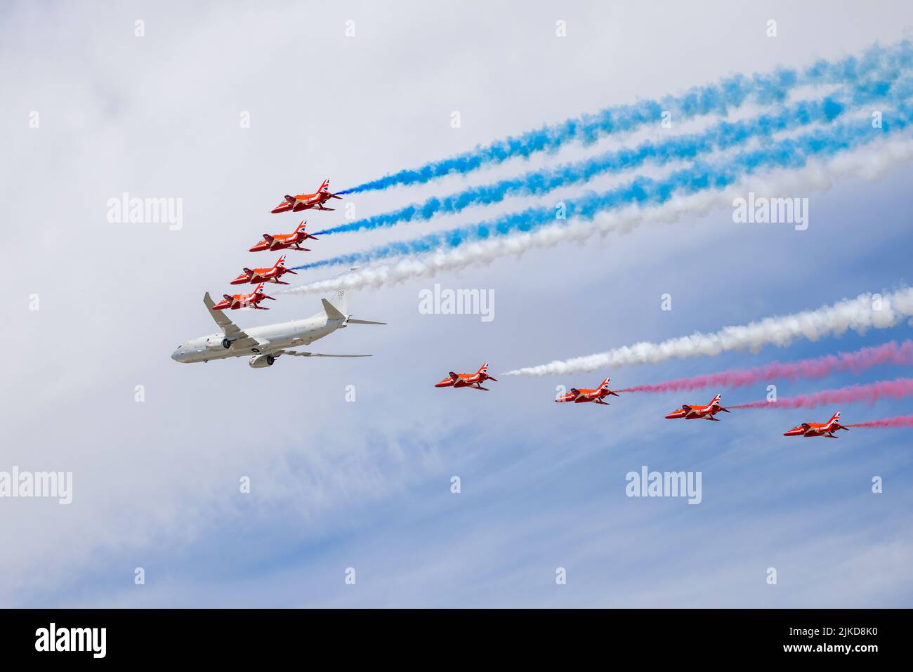 Royal Air Force Boeing P-8A Poseidon MRA Mk1 performing a Flypast with the Red Arrows at the Royal International Air Tattoo on the 15th July 2022 Stock Photo