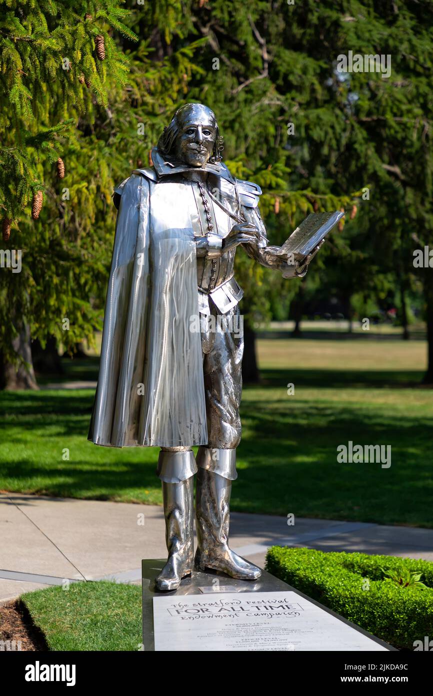 Metal statue of William Shakespeare stands in the park near the festival theater. Stratford Ontario Canada. Stock Photo