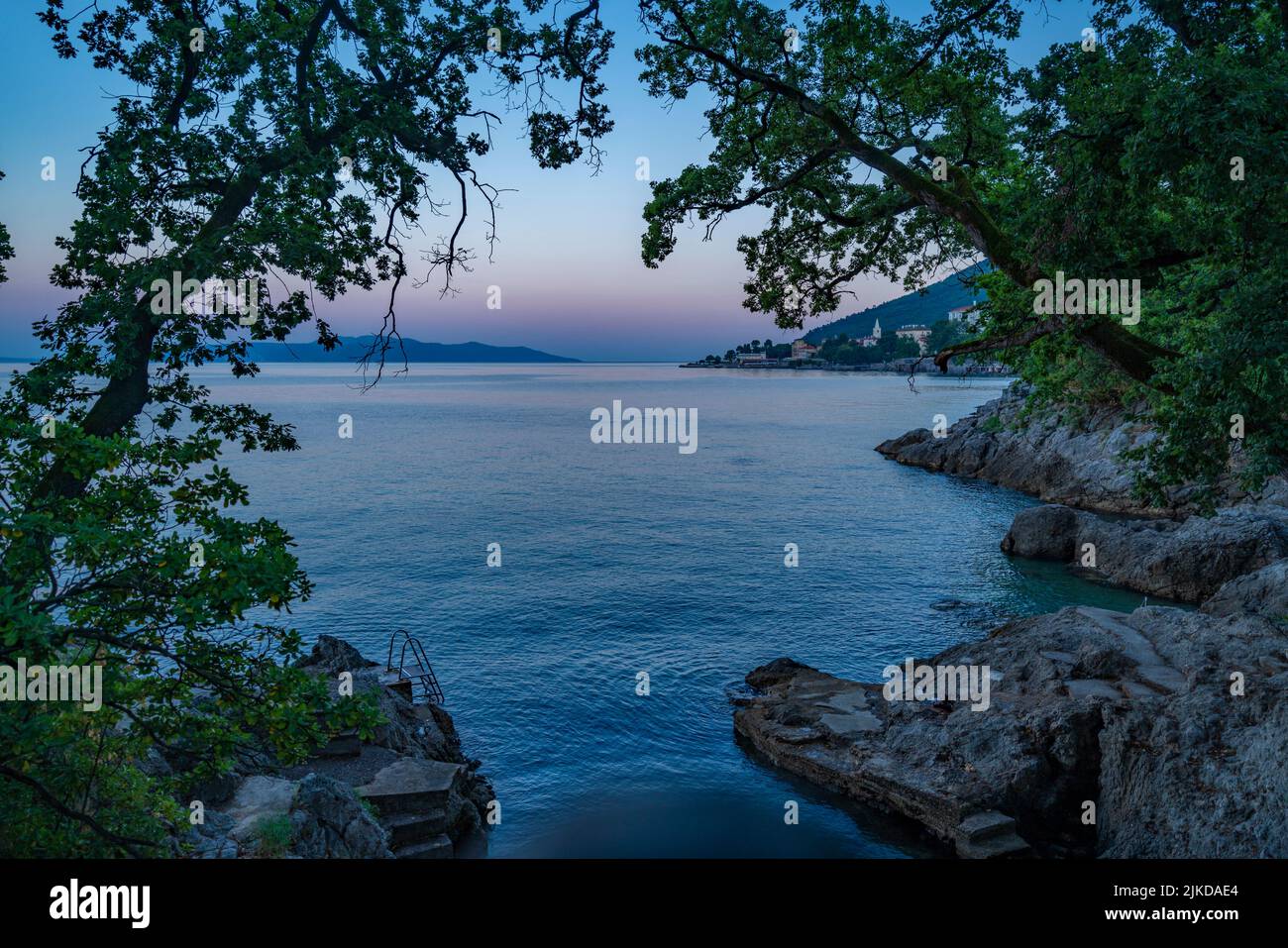 View of Lovran and Krk Island in background at sunset, Lovran, Kvarner Bay, Eastern Istria, Croatia, Europe Stock Photo